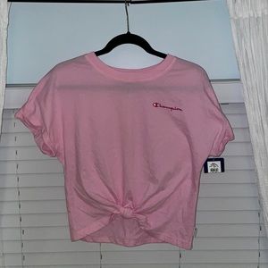 Pink champion shirt, size S.